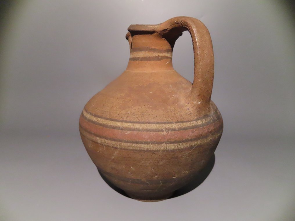 Cipriota Ceramica Brocca globulare con manico. Periodo arcaico 700 - 600 a.C. 23 cm di altezza. Integro. Enorme. #2.1