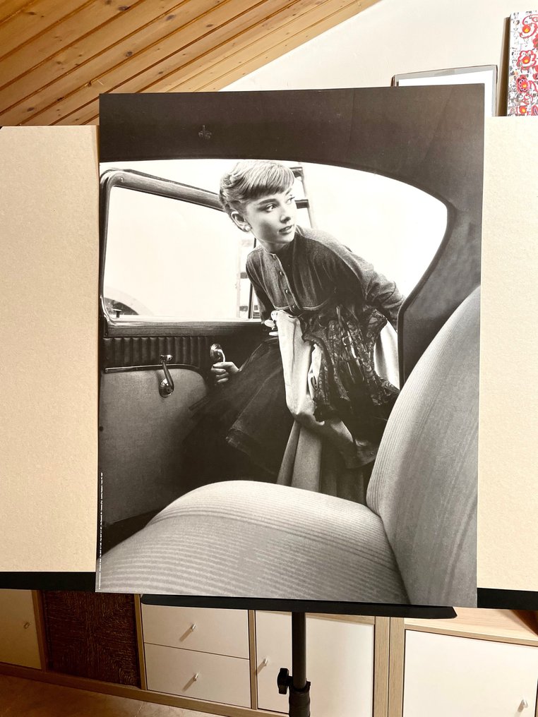 Bob Willoughby - Audrey Hepburn getting into the car (1954) #2.2