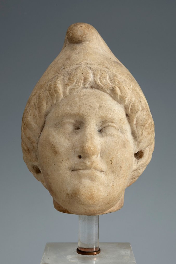 Roma Antiga Mármore Cabeça da escultura de Attis. Séculos II a III d.C. 24 cm H. Muito bem. Licença de exportação #1.1