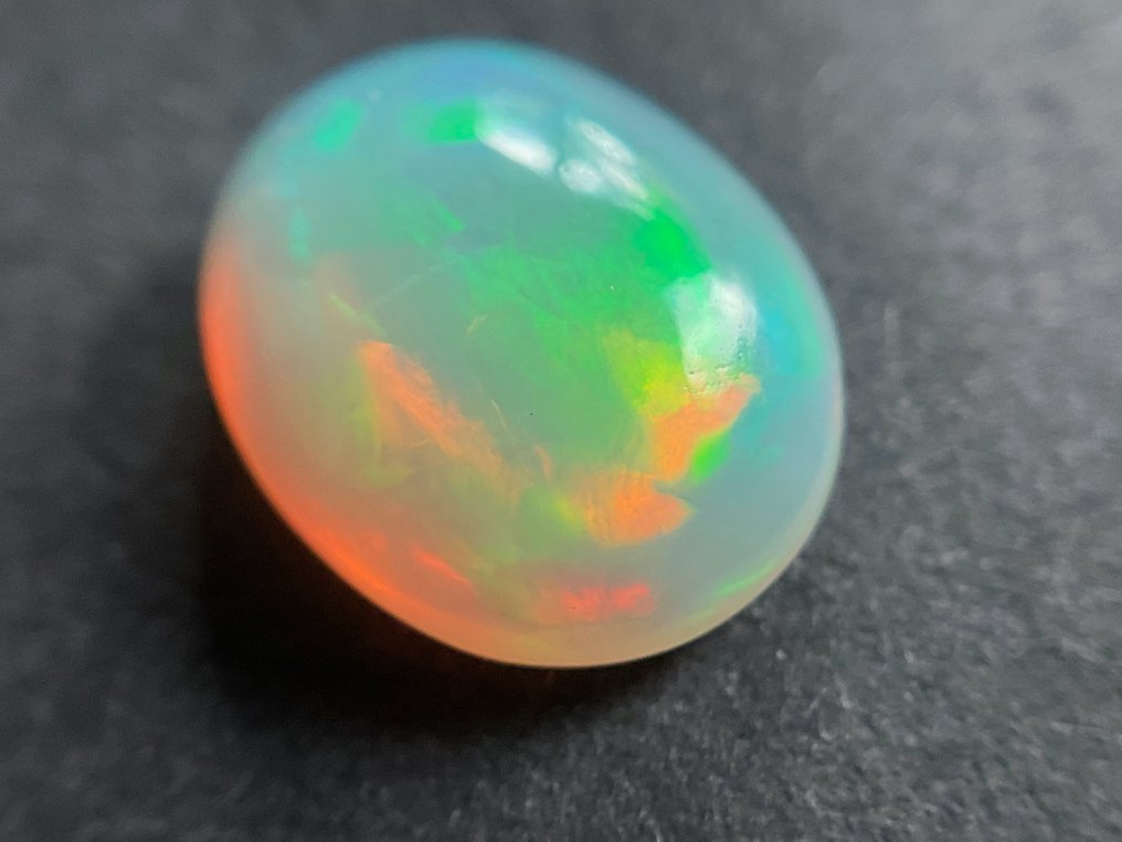 Alb portocaliu + Joc de culori (viu) Opal de cristal - 2.56 ct #2.1
