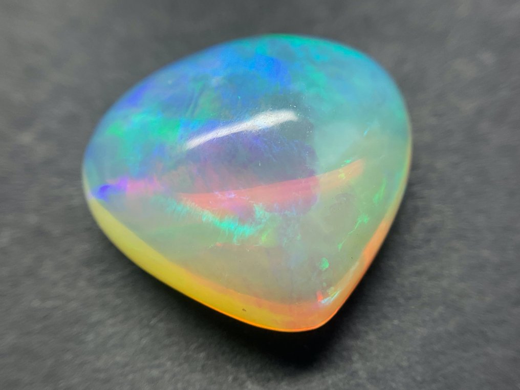 White (orange) + Play of Color (Vivid) Crystal opal - 7.56 ct #2.1