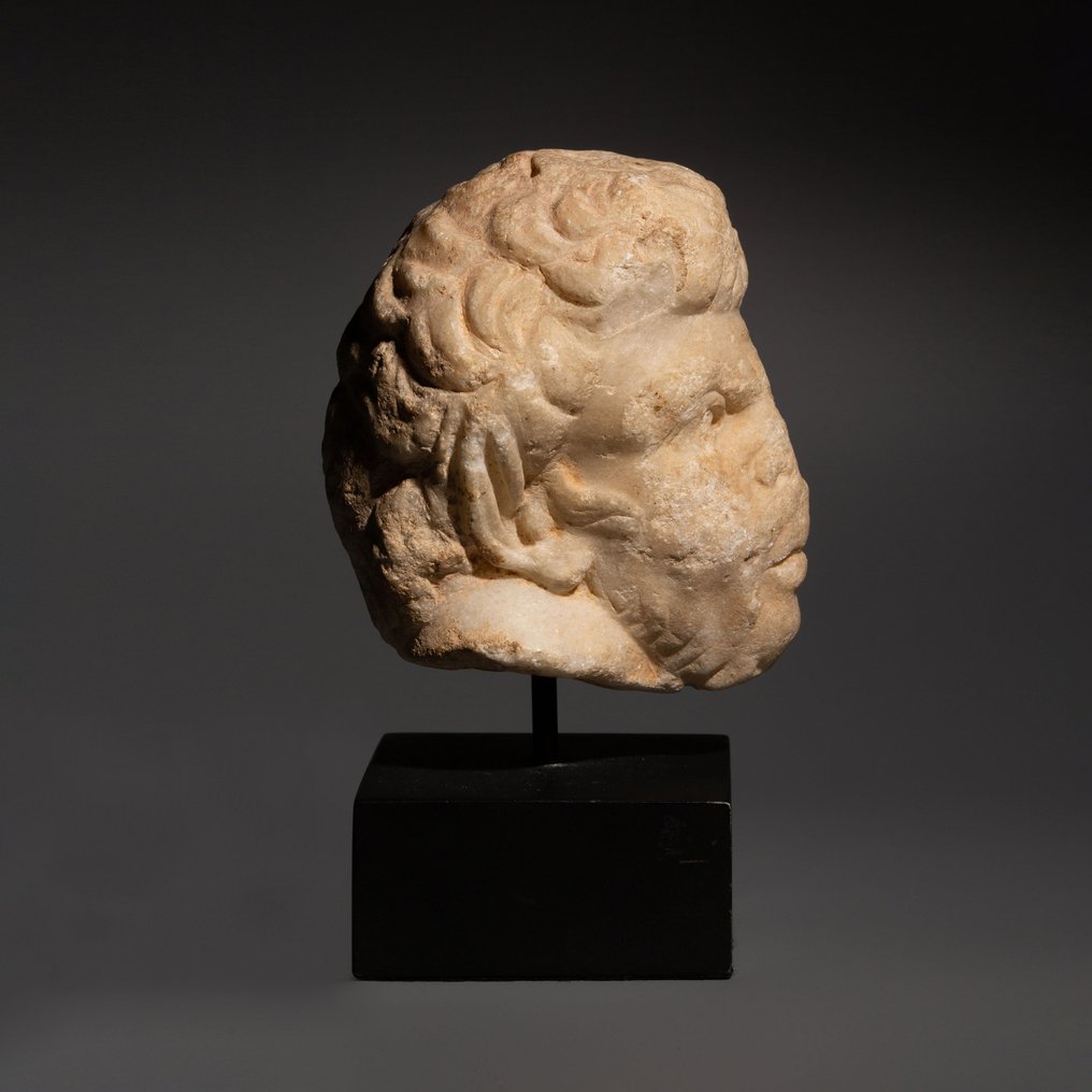 Romerska antiken Marmor Trevligt huvud av en Satyr. 1:a-2:a århundradet e.Kr. 13 cm H. Ex. Royal-Athena Galleries. Spansk #2.1