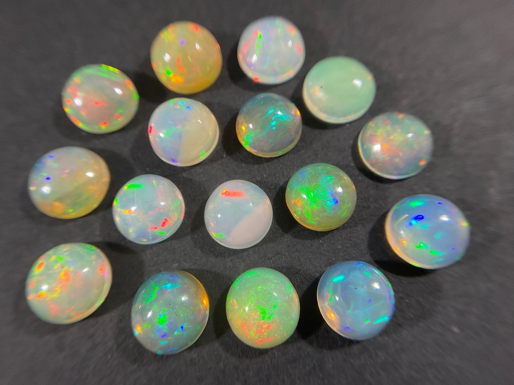 16 pcs white-orange + Play of Color crystal opals - 5.17 ct #1.1