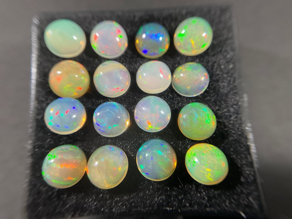 16 pcs white-orange + Play of Color crystal opals - 5.17 ct #2.1