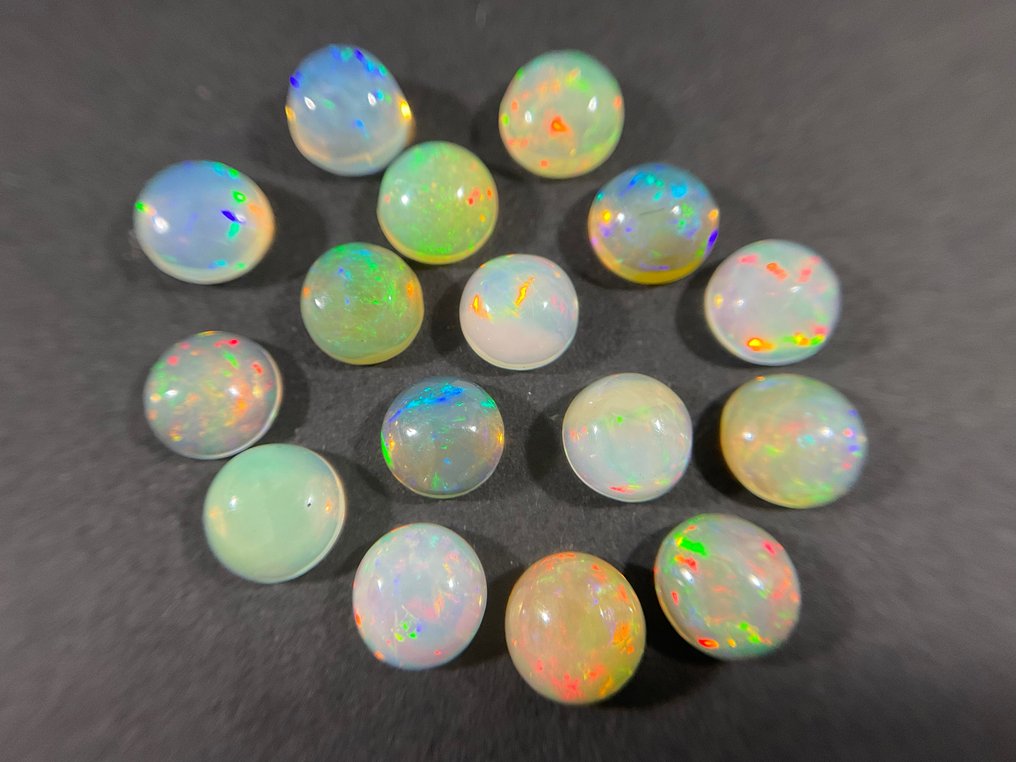 16 pcs white-orange + Play of Color crystal opals - 5.17 ct #2.2