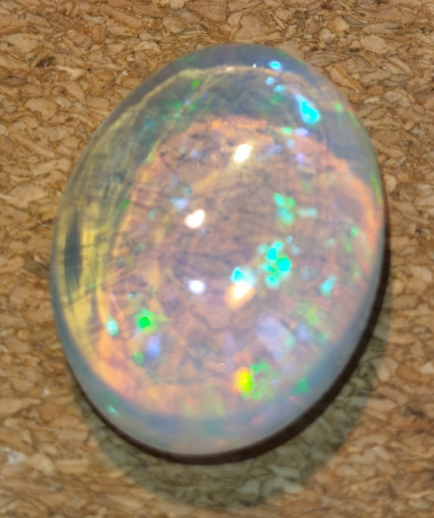 White (Orangy) + Play of Colors (Vivid) Opal - 24.94 ct #2.1