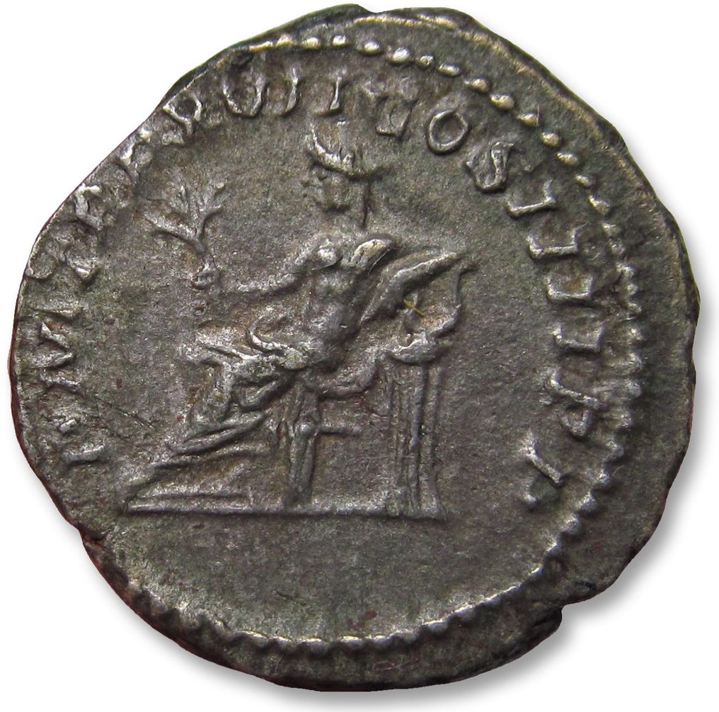 Romarriket. Caracalla (AD 198-217). Denarius Rome mint 214 A.D. - Apollo seated left, leaning on lyre set on tripod - #1.1