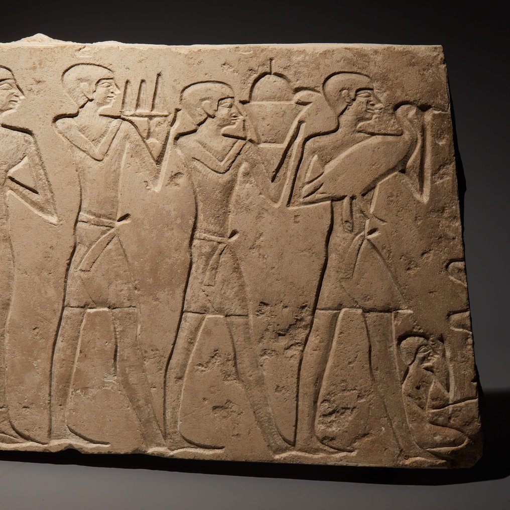Ancient Egyptian Limestone Mastaba relief offerings to the deceased. Old Kingdom, 2200 - 2050 BC. 36 cm length. French export #2.1