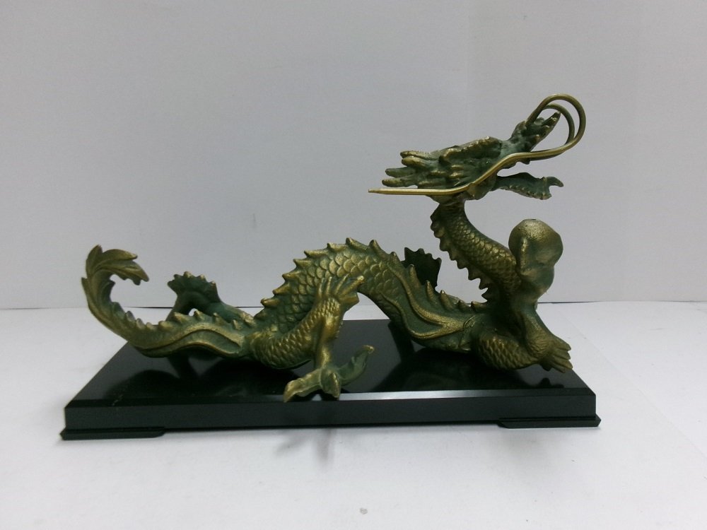 Iron (cast/wrought) The dragon of the product made in Iron (cast