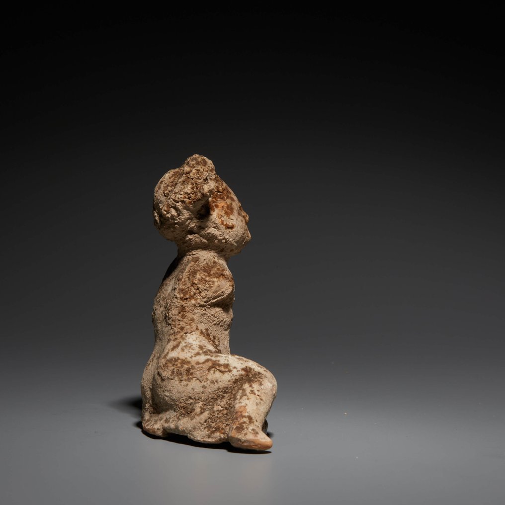 Ancient Greek Terracotta Child Figure. 4th century BC. 6 cm height. Private collection of Clément Massier (1844 - 1917). #3.2
