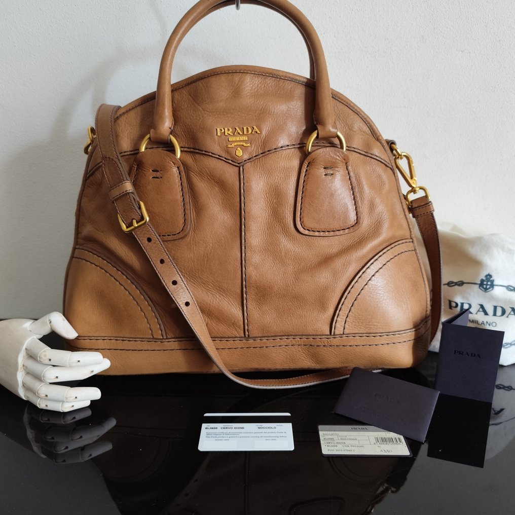 Prada 3 in 1 bag price outlet