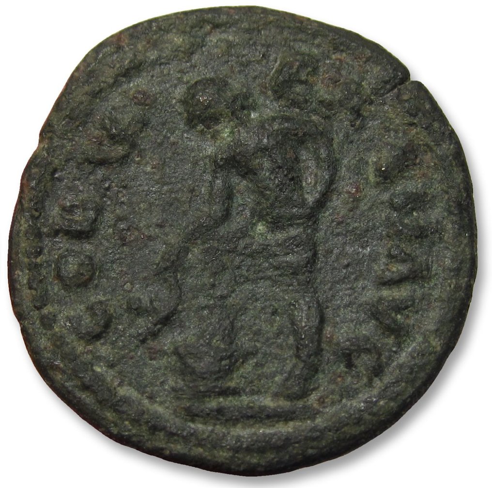 Römische Provinz. Caracalla (198-217 n.u.Z.). AE 25mm provincial coin (As) TROAS, Alexandria Troas 198-217 A.D. - scarcer cointype - Apollo standing on altar #1.2