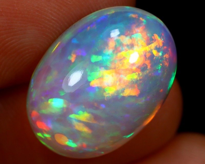 10.25ct Extremely Bright Blue Ethiopian Crystal Welo Opal 5/5 Fire Gorgeous Pattern RARE! Cabochon - Height: 18.8 mm - Width: 13.7 mm- 2.05 g #1.1