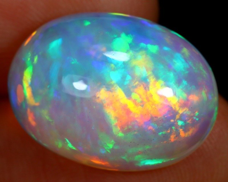 10.25ct Extremely Bright Blue Ethiopian Crystal Welo Opal 5/5 Fire Gorgeous Pattern RARE! Cabochon - Height: 18.8 mm - Width: 13.7 mm- 2.05 g #2.1