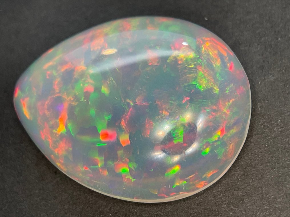 Light Orange + Play of Colors Crystal Opal - 13.06 ct #2.2