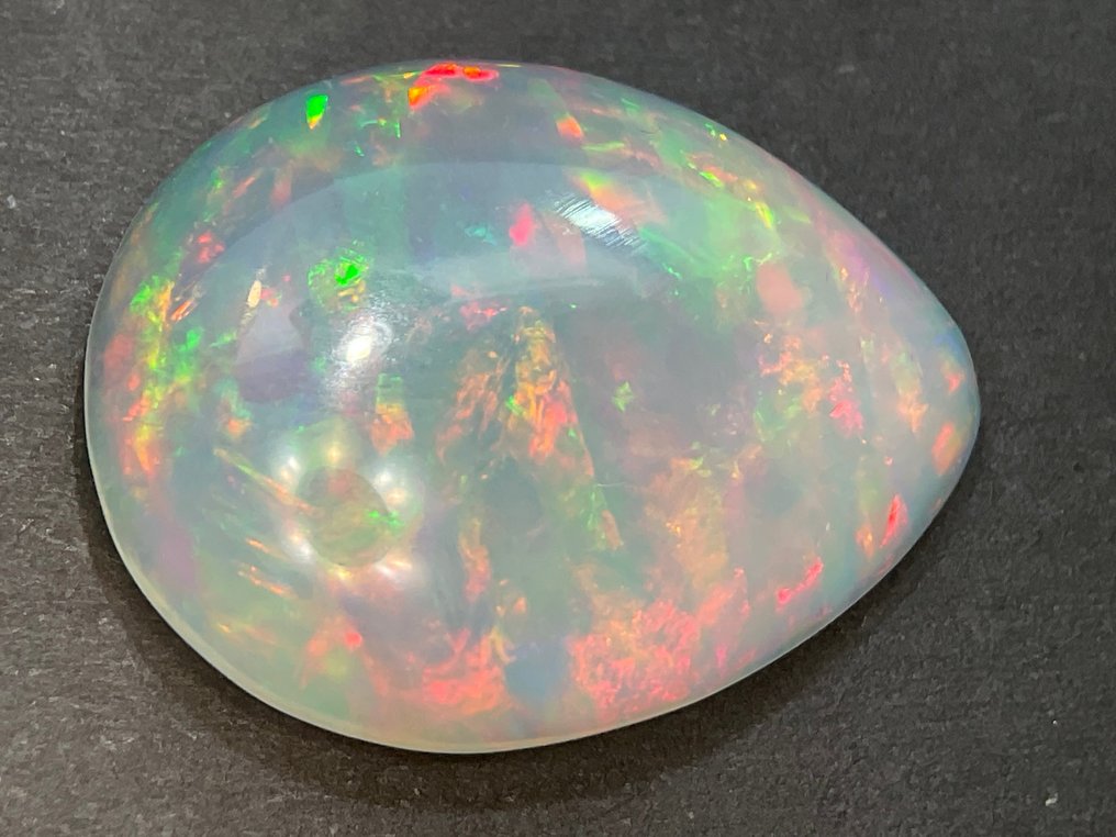 Light Orange + Play of Colors Crystal Opal - 13.06 ct #1.1