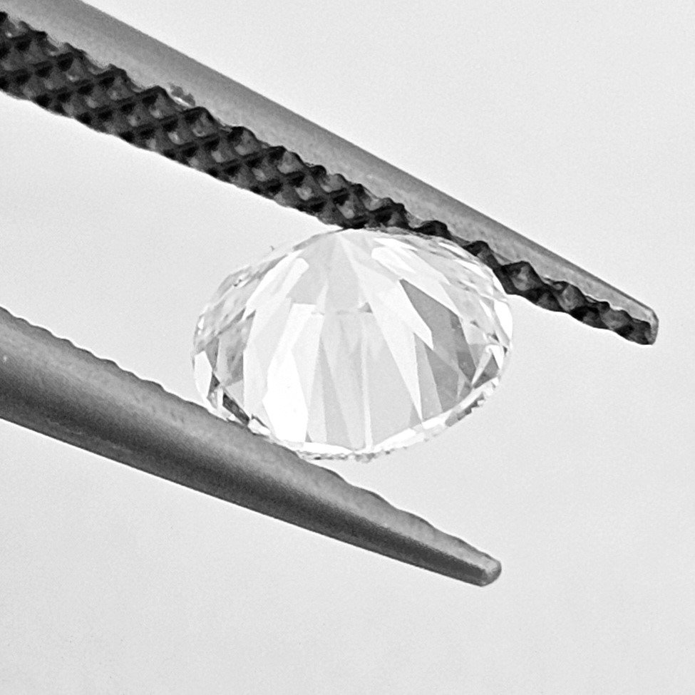 1 pcs Diamant  (Natuurlijk)  - 0.70 ct - Rond - E - SI2 - Gemological Institute of America (GIA) #3.2