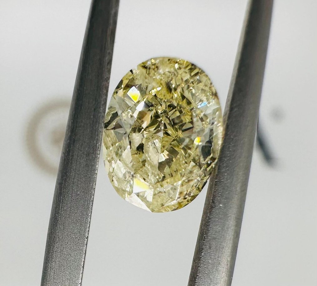 1 pcs 钻石 - 1.01 ct - 明亮型, 椭圆形 - 中彩黄 - 证书上未提及 #1.1