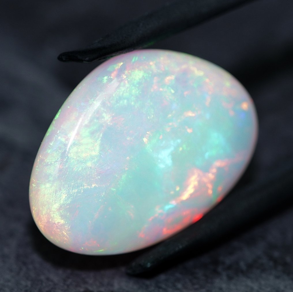 Opal  - 20.98 ct - International Gemological Institute (IGI) #3.2