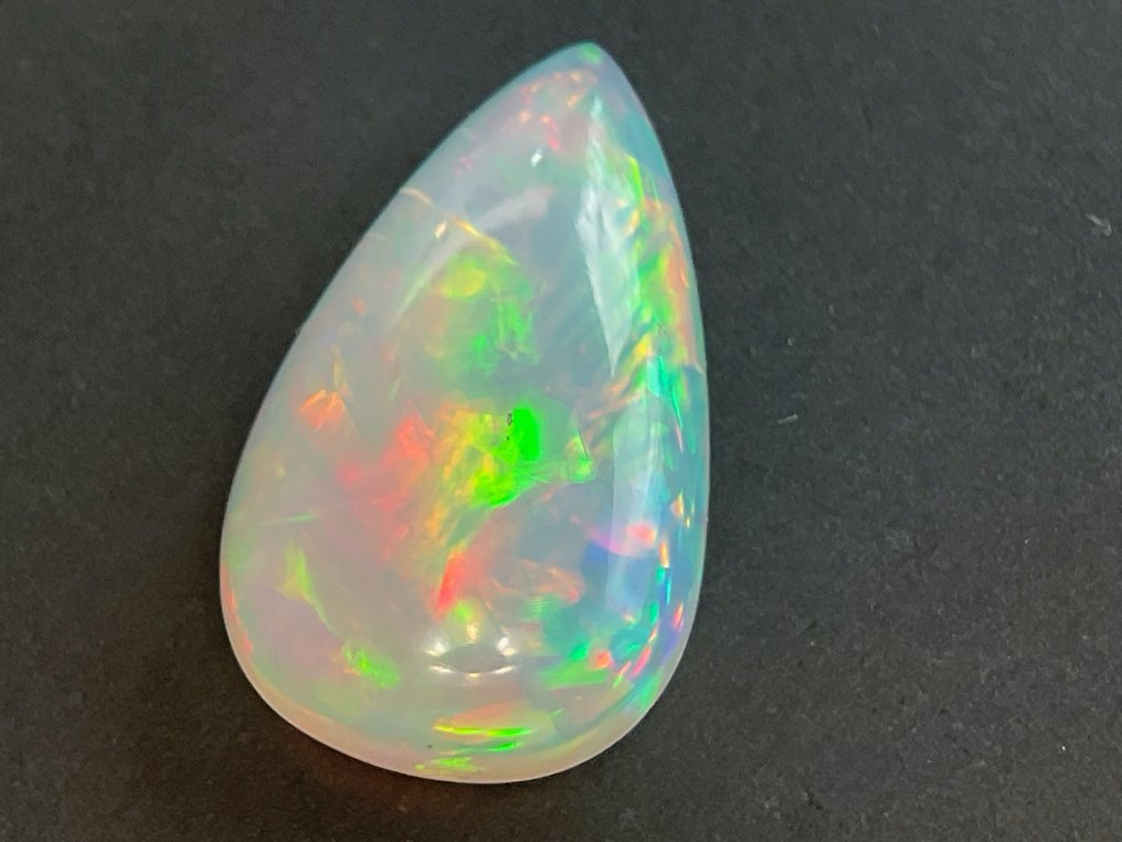 Vaaleanoranssi + värien leikki Luonnollinen opaali - 6.29 ct #2.2