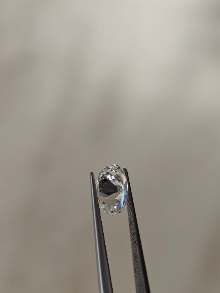 1 pcs Diamant - 0.70 ct - Oval - E - SI1 #2.1