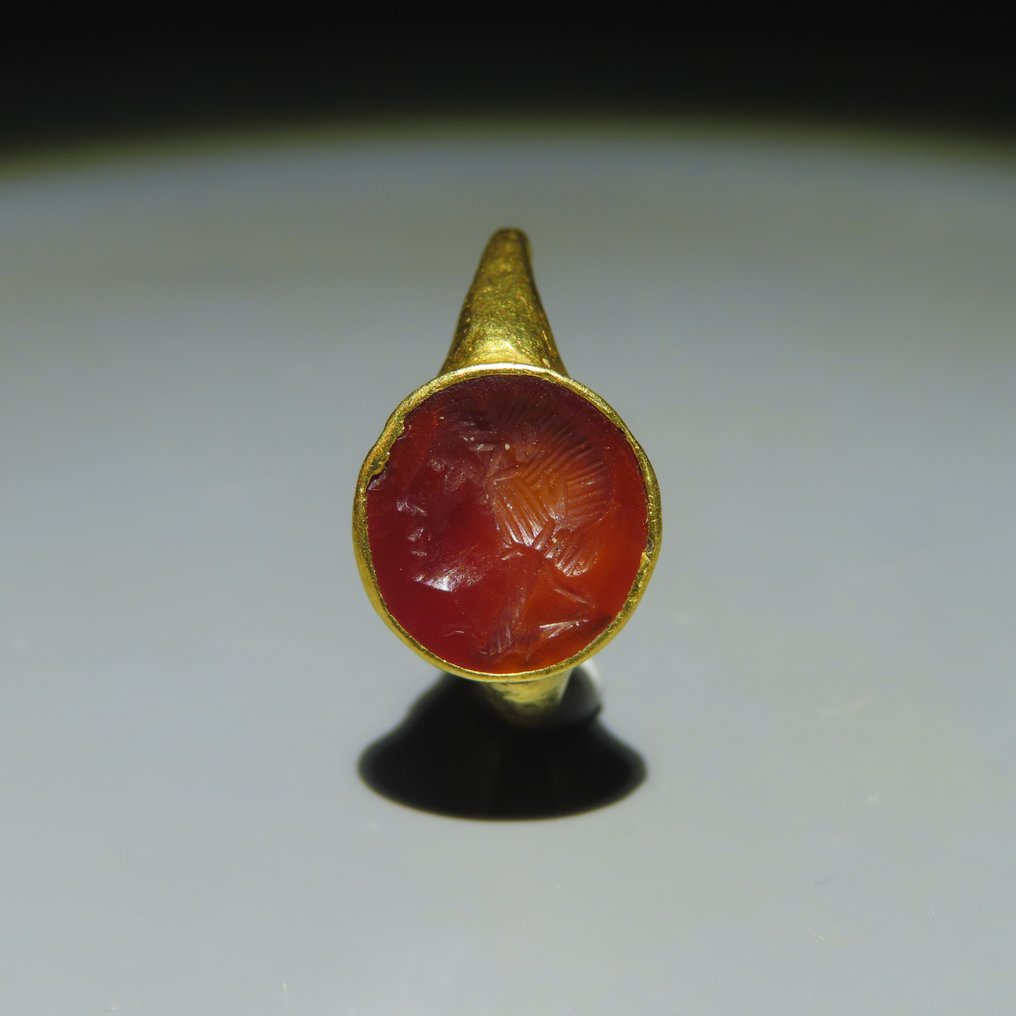 Ancient Roman Gold, Chalcedonite Gold ring with Apollo bust setting. 1st century BC-1st century AD. 2.4 cm L. #2.1
