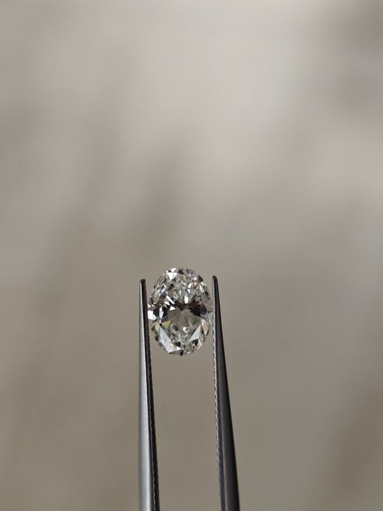 1 pcs Diamant - 0.70 ct - Oval - E - SI1 #1.1