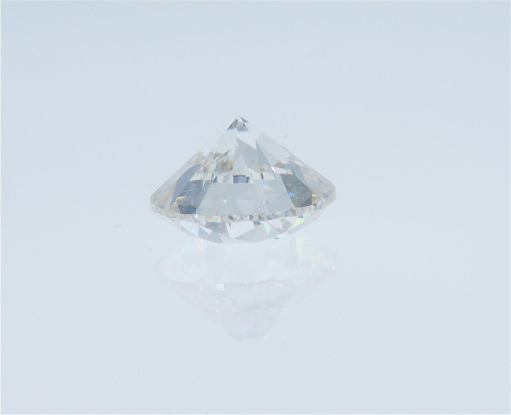 Diamant  (Natur) Rund  - 0.91 tw. - International Gemological Institute (IGI) #2.1