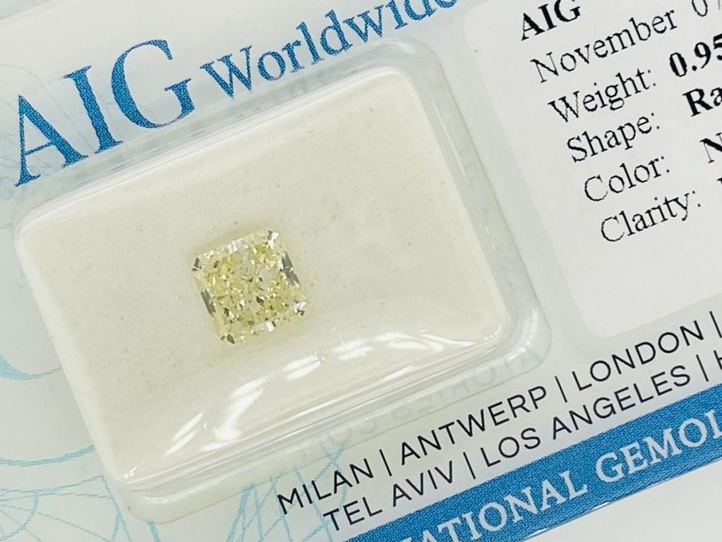 1 pcs Diament  (W kolorze naturalnym)  - 0.95 ct - radiant - Fancy light Żółty - I1 (z inkluzjami) - Antwerp International Gemological Laboratories (AIG Izrael) #2.1