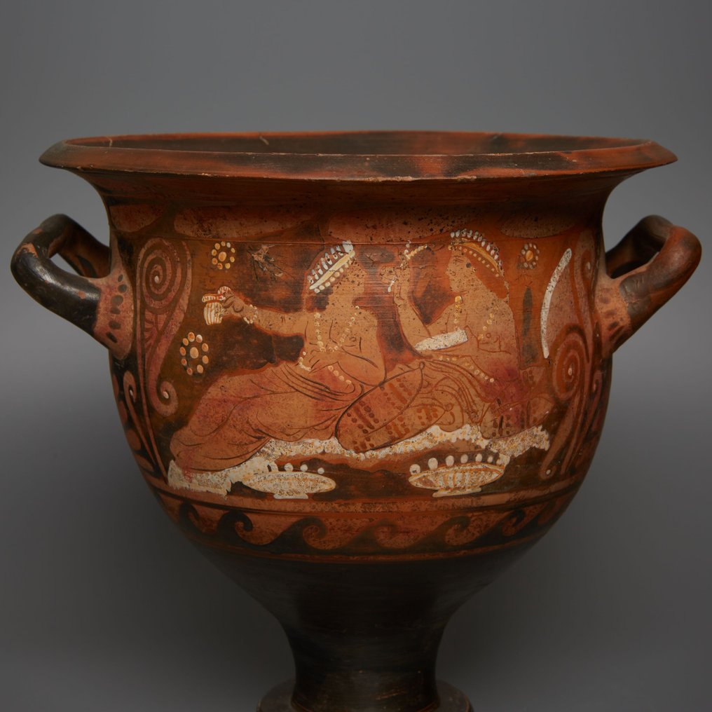 Magna Grecia, Campania Pottery Bell crater with a banquet scene. 4th century BC. 25 cm height. #1.1