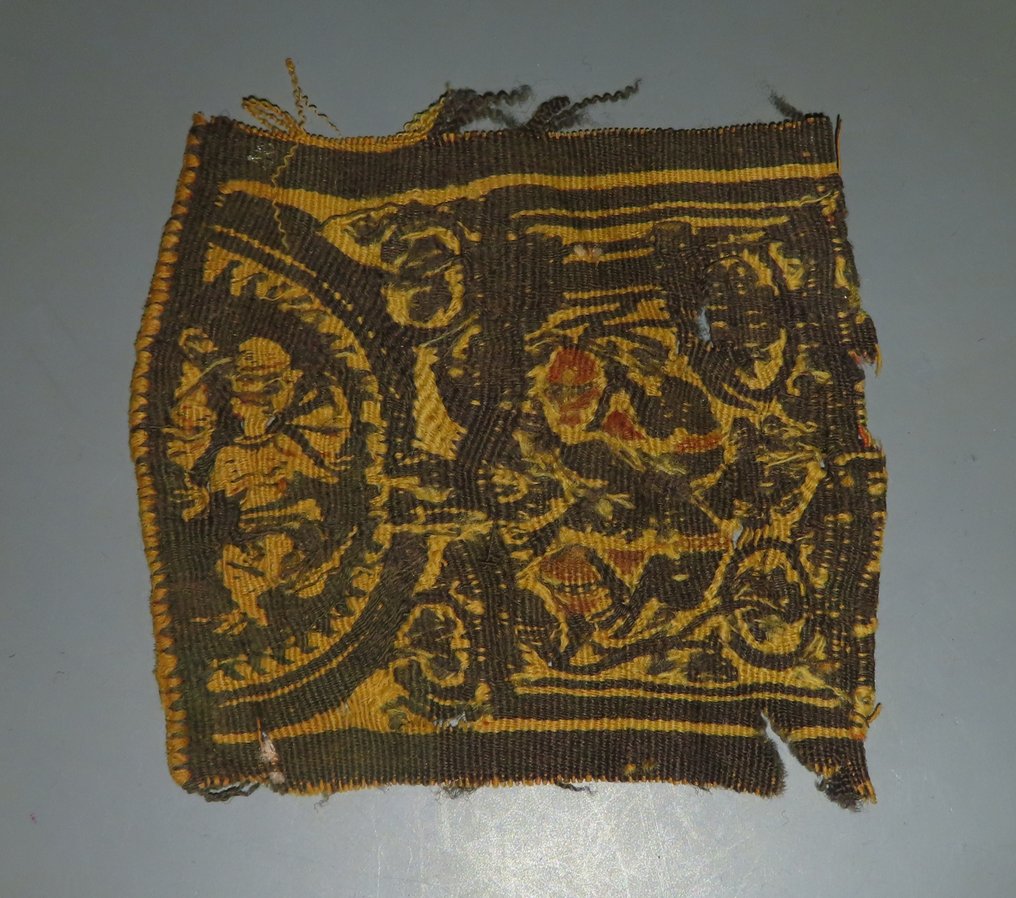 Oud Egypte, Koptisch Wol Textielfragment. 6e eeuw na Christus. 10,5 cm lengte.  (Zonder Minimumprijs) #1.2
