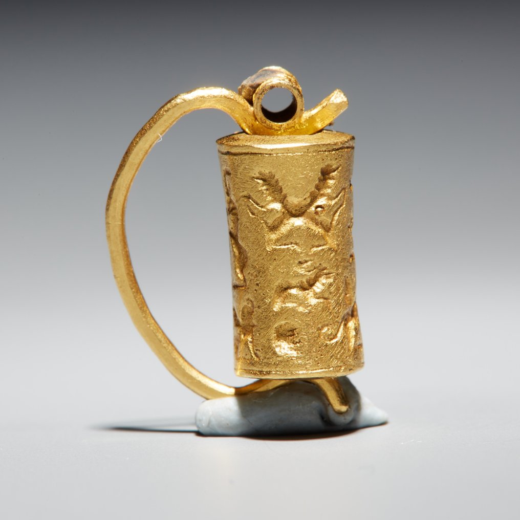 Mesopotâmico Ouro Selo cilíndrico. 3º-1º milênio AC. Comprimento 1,6 cm. #3.3