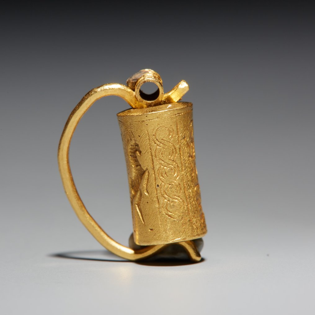 Mesopotámico Oro Sello cilíndrico. III-I milenio antes de Cristo. Longitud 1,6 cm. #1.2