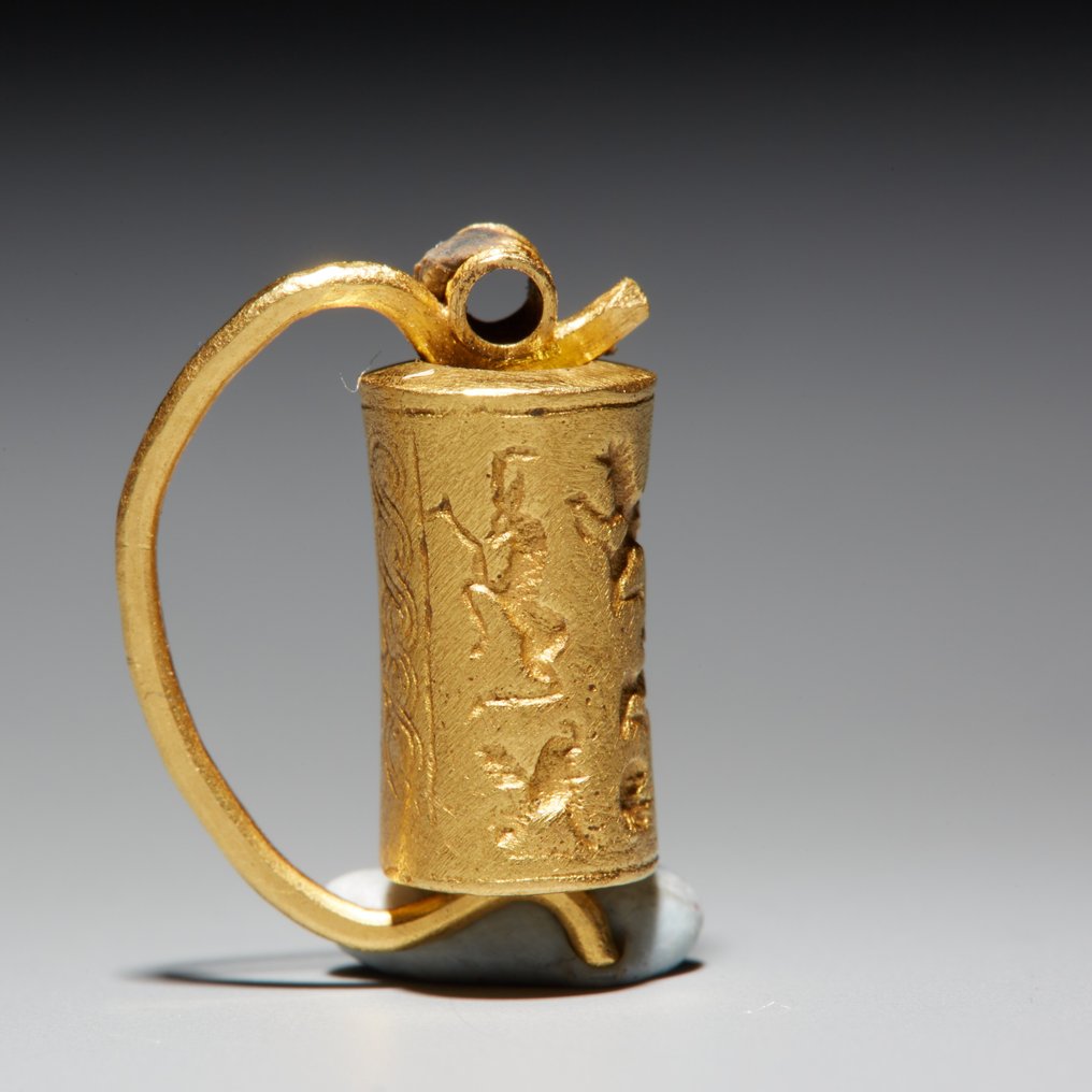 Mesopotâmico Ouro Selo cilíndrico. 3º-1º milênio AC. Comprimento 1,6 cm. #1.1