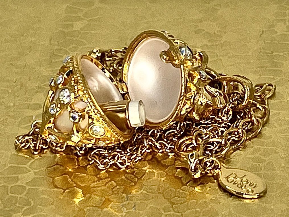 Joan rivers secret of the scroll faberge egg locket aurora borealis