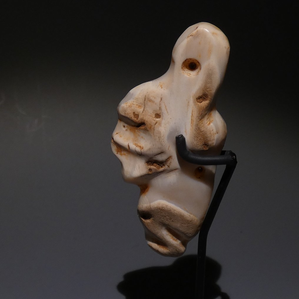 Taino, Caribe Os Amuleta craniului. 8,5 cm H. foarte fin. 800 - 1400 d.Hr. Licență de import spaniolă. #1.2