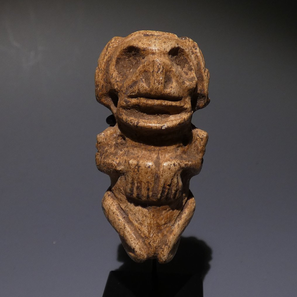 Taino, Caribe Os Amuleta craniului. 6,5 cm H. foarte fin. 800 - 1400 d.Hr. Licență de import spaniolă. #1.1