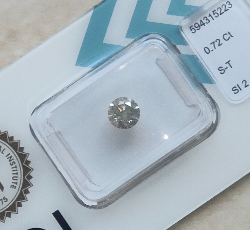 1 pcs Diamant  (Natuurlijk)  - 0.72 ct - SI2 - International Gemological Institute (IGI) - S-T #2.1