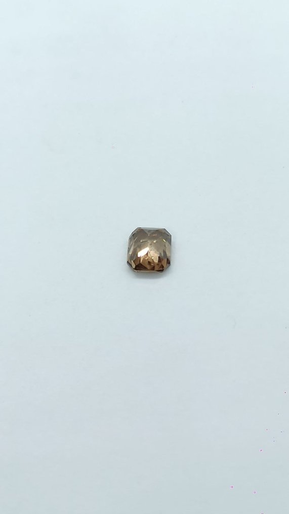 1 pcs Diamant - 0.74 ct - Smaragd - Brown - svagt brun rosaorange - SI2 #2.1