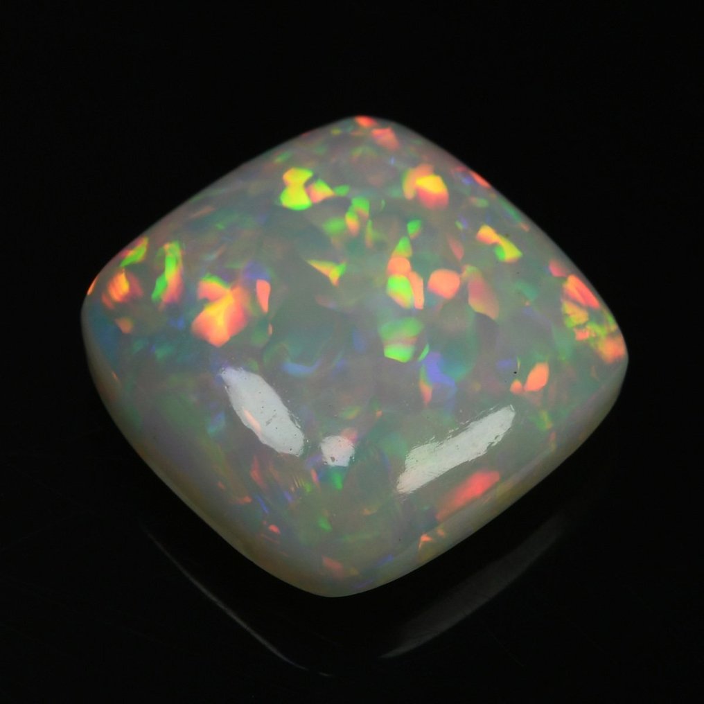 1 pcs Fin fargekvalitet-hvit (gulaktig) + fargespill (levende) Opal - 6.88 ct #2.1