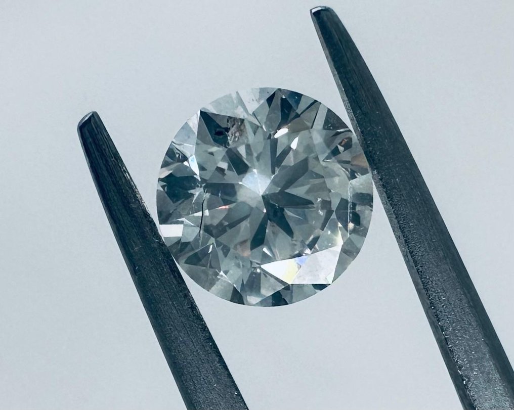 1 pcs Diamant  (Natur)  - 1.00 ct - Rund - J - I1 - International Gemological Institute (IGI) #2.2