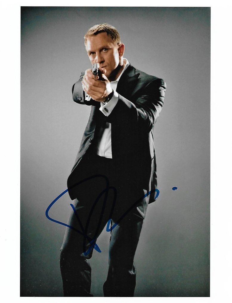 James Bond 007: Skyfall - Daniel Craig Autographed Photo in classic Bond pose with gun b'bc COA. #1.2