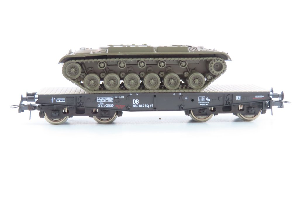 Roco, Minitanks H0 - 858 - Modeltrein goederenwagon (1) - 2-assige lage platte wagen type SSY met lading M-48 (militair voertuig) - DB #2.1