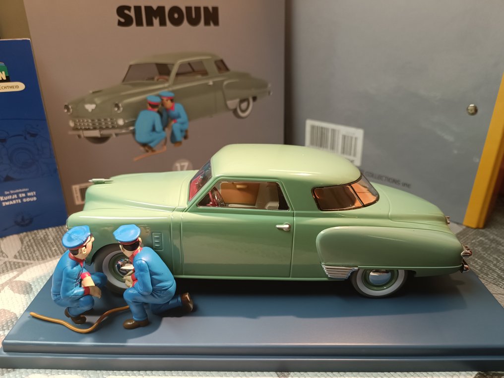 Tintin - 2 malliautot - 1/24 + virallinen sideaine - studebaker simounin autotallilta kullan maassa - Moulinsart / Hachette / Atlas #1.1