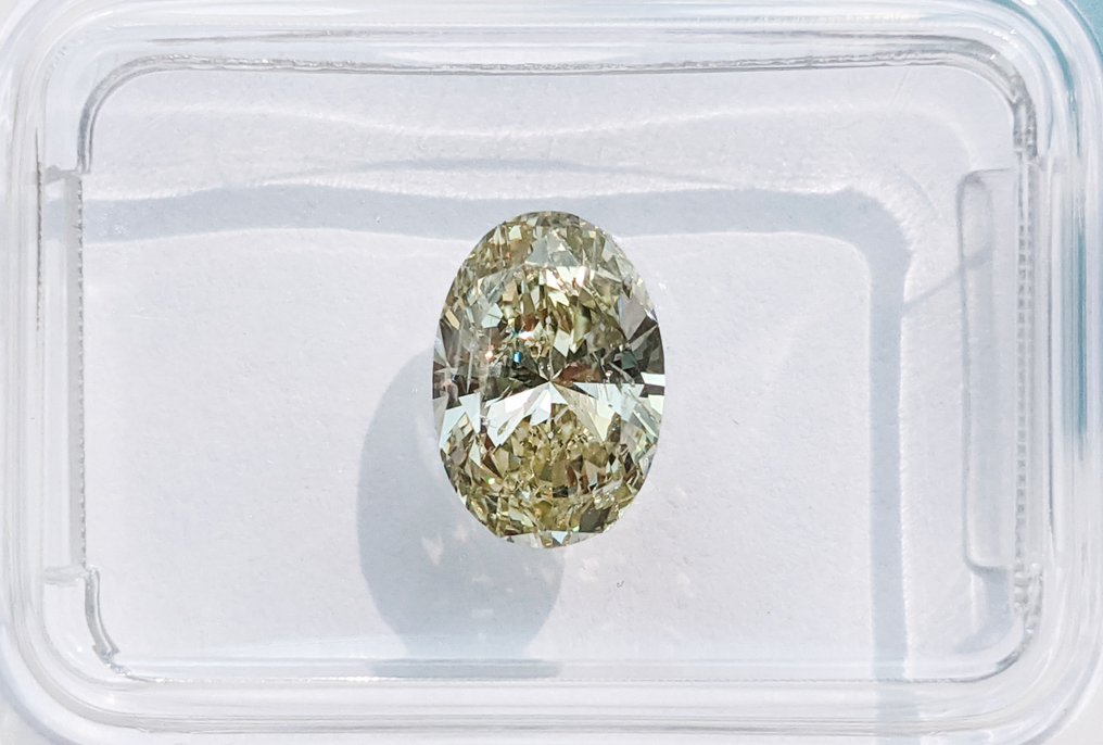 1 pcs 钻石  (天然色彩的)  - 1.20 ct - 椭圆形 - Fancy light 黄色 - SI2 微内含二级 - 国际宝石研究院（IGI） #1.0