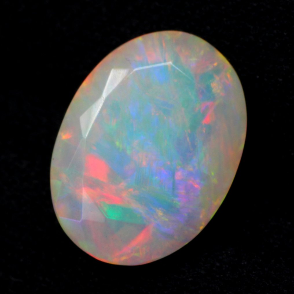 Bez ceny minimalnej
 Pomarańczowy Opal  - 3.45 ct - International Gemological Institute (IGI) - Gra wielu kolorów #2.1