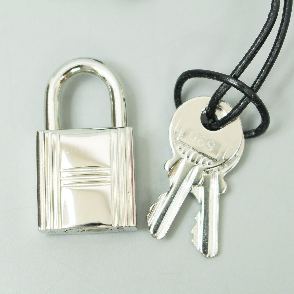Lucchetto hermes originale clearance