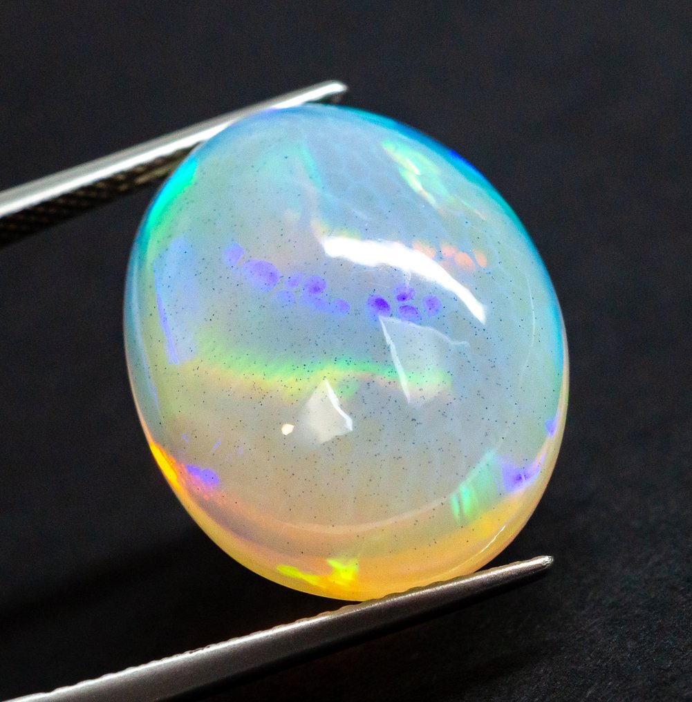 Utan reservationspris Opal  - 16.93 ct - Gem Report Antwerpen (GRA) - Vit 'spel av färger' #2.1