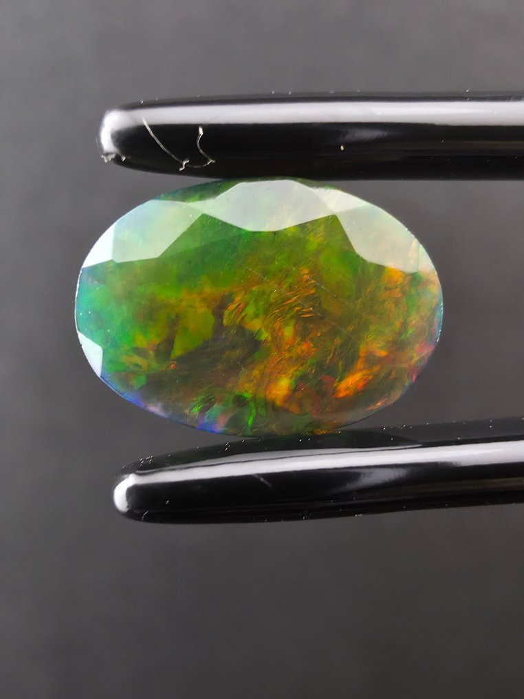 1.4克拉黑欧泊 多面 - 高度: 10.8 mm - 闊度: 7.8 mm- 0.28 g #2.1