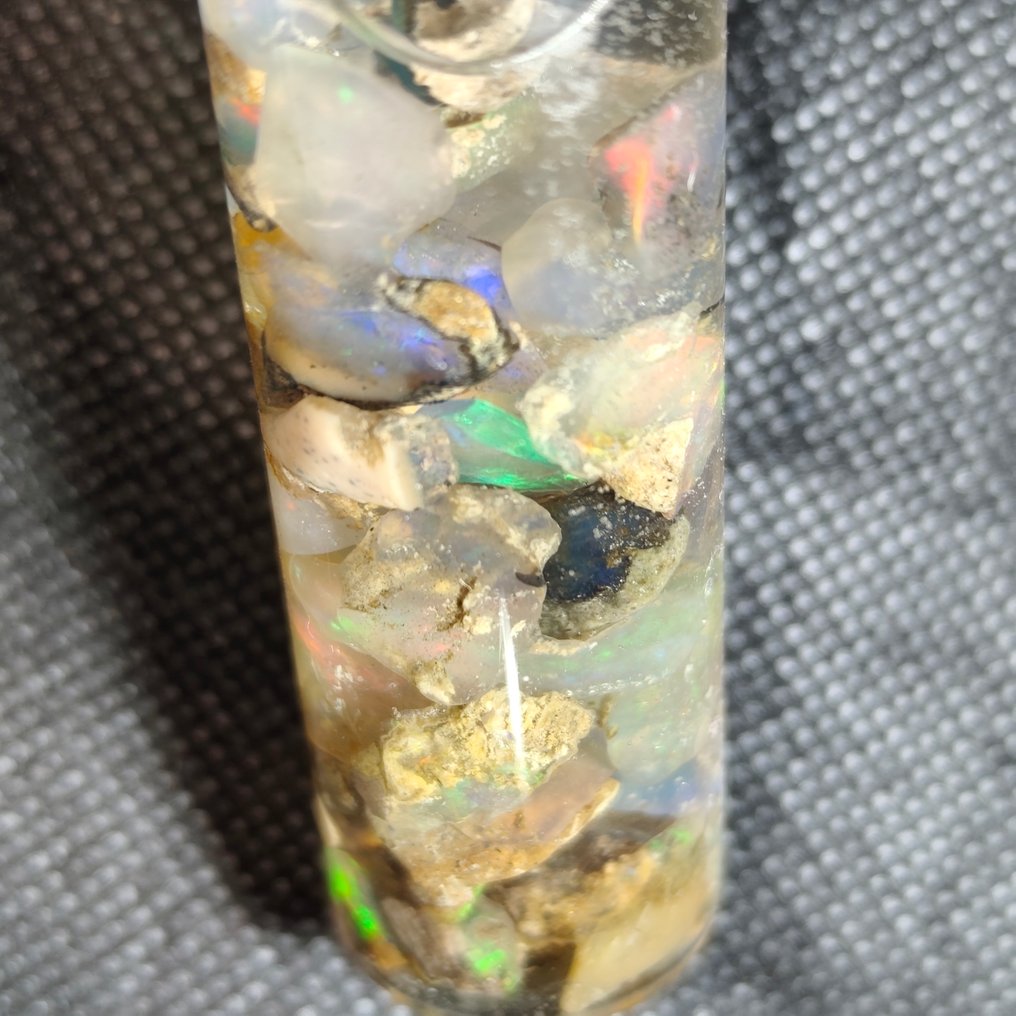 70 carats of Welo opal rough and pre-polished stones. Rough- 14 g - (1) #3.2